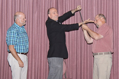 Munsey's Magic performs handcuff routine