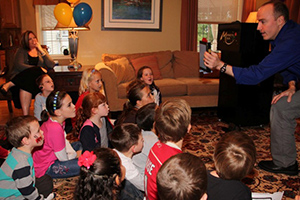 Munsey's Magic performs at a child's birthday party